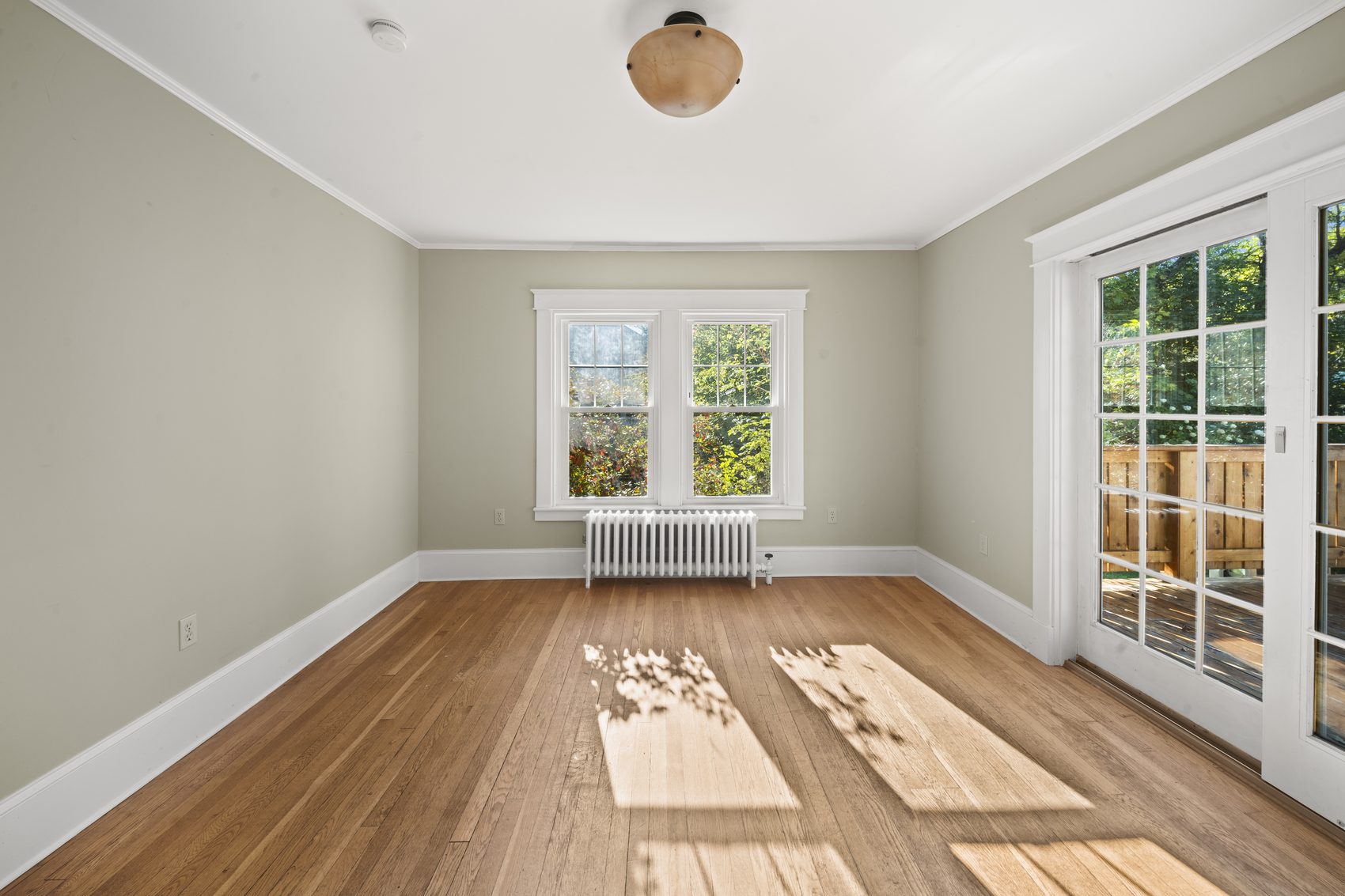 Empty, unstaged living room
