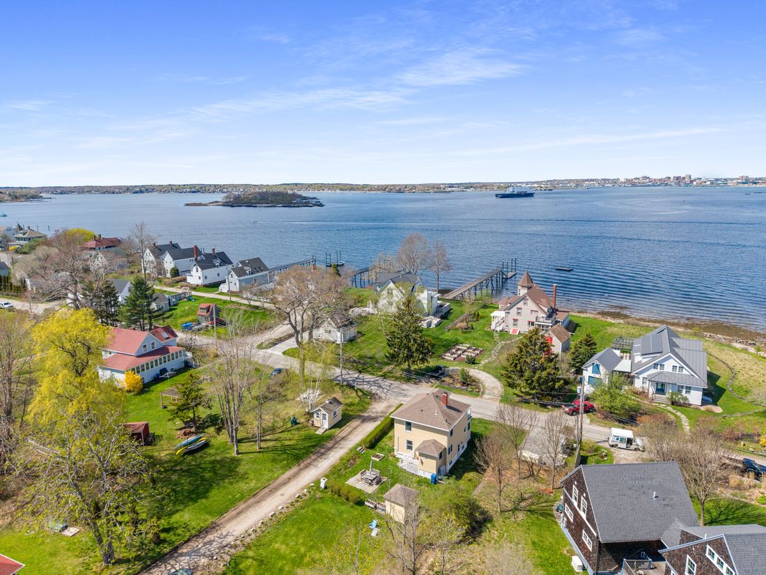 Aerial drone photo of a coastal property
